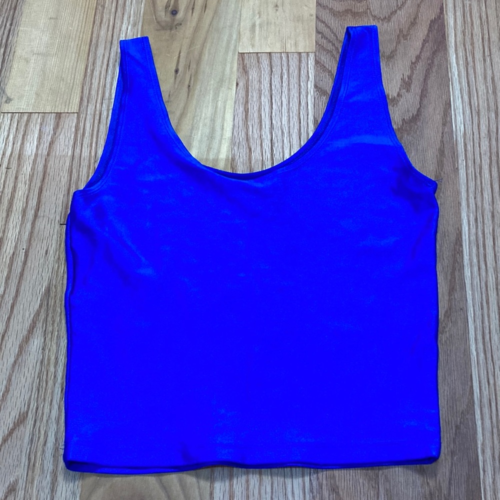 Marika Indigo Blue Top 84% Nylon 6% Spandex Sz S. Excellent Condition.